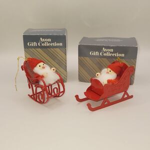 Lot 2 Vtg Avon Frolicking Santas Ornament Set Santa on Sleigh Rocking Chair EUC